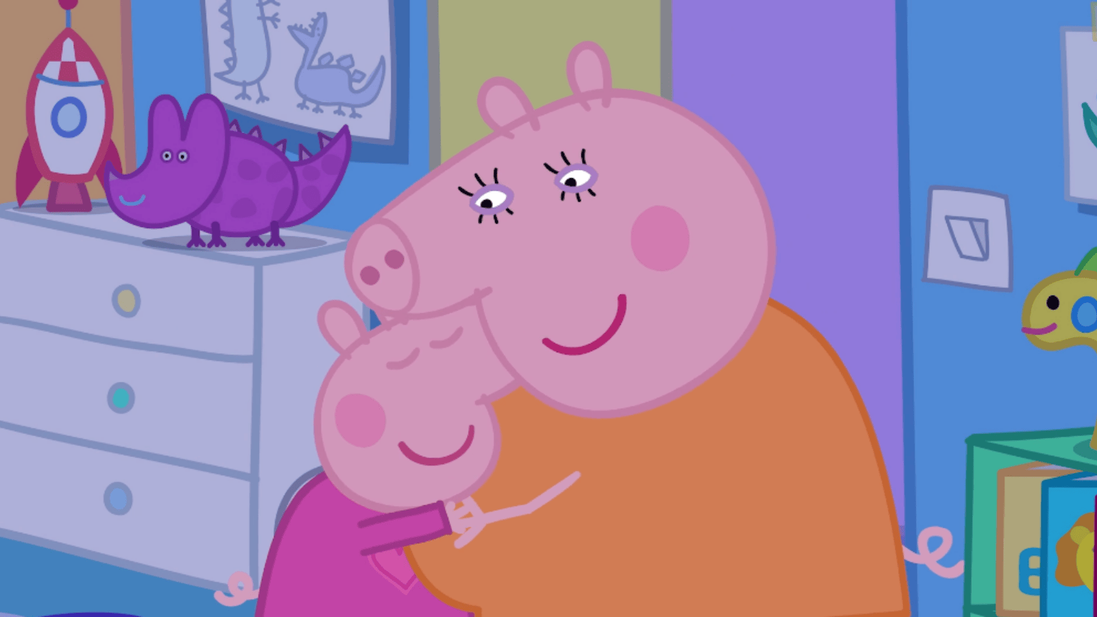 Animated pig characters Peppa and Mummy Pig share a loving hug in a child’s bedroom decorated with colorful dinosaur drawings and toys.